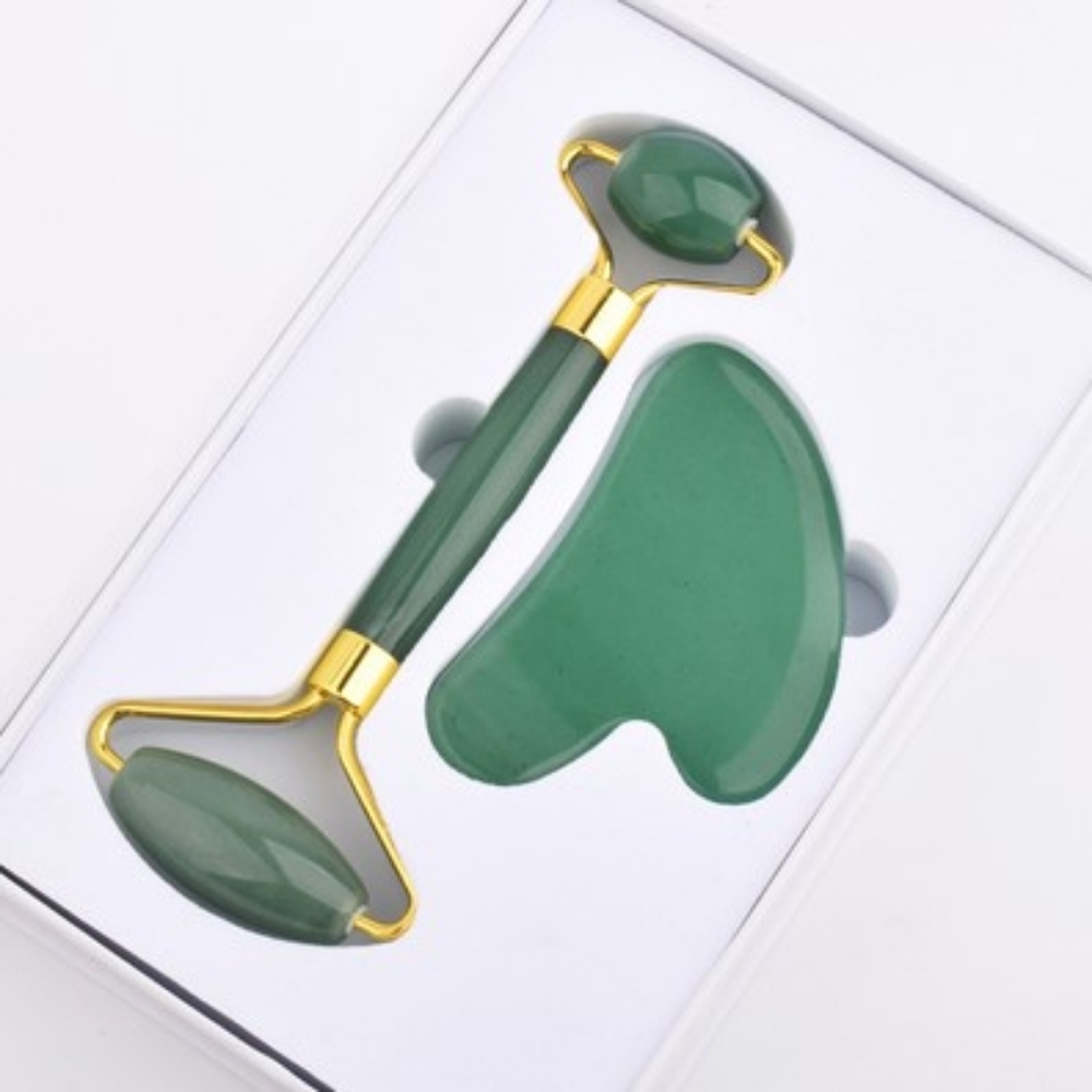 Jade facial roller and Gua Sha